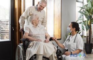 Nurse with mask comforting patient
