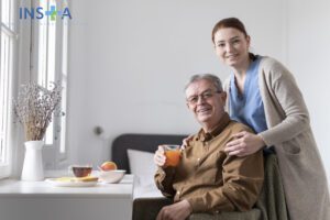 happy nurse and patient during breakfast